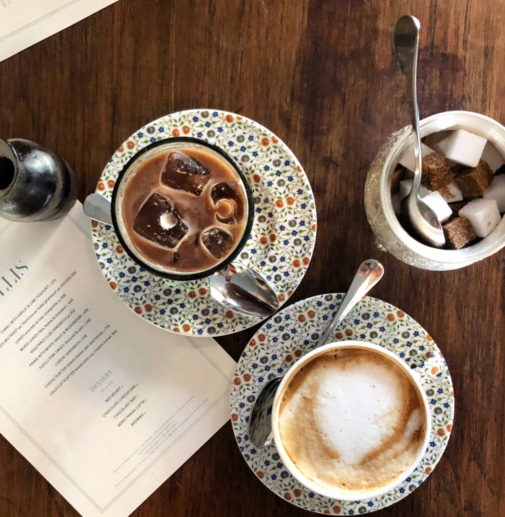 a flatlay of coffee at a cafe in Mumbai